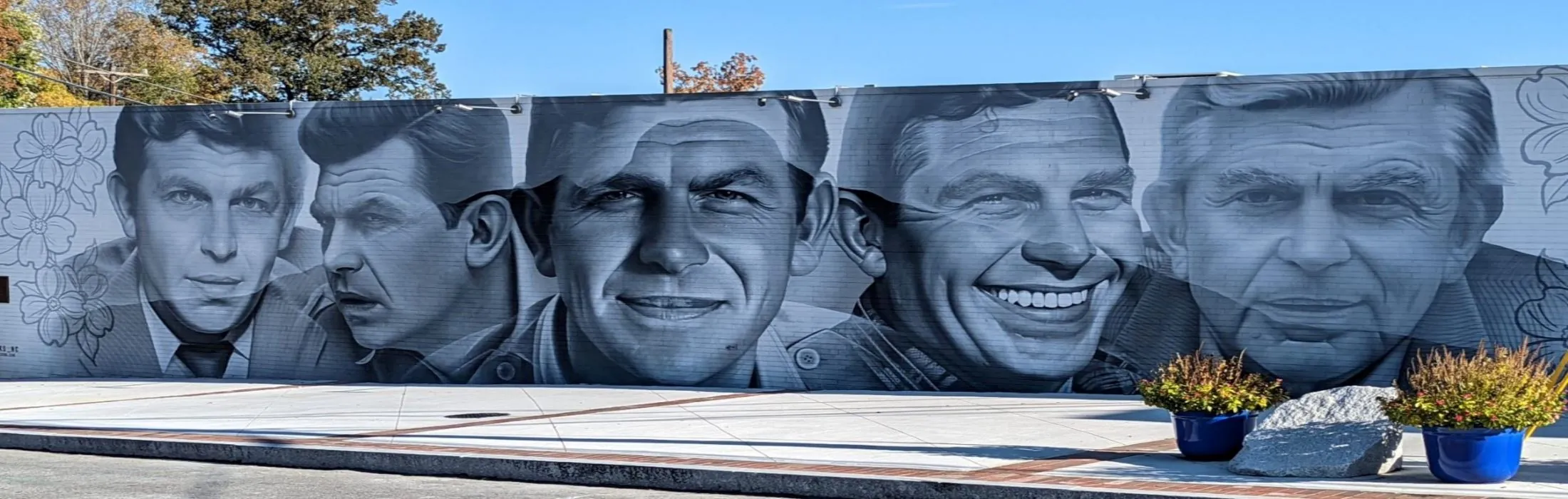 The Andy Griffith mural, a large grayscale portrait wall on a downtown Mount Airy building